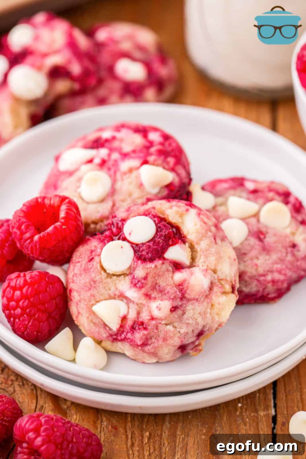 A few Raspberry White Chocolate Cookies on a a white serving plate.