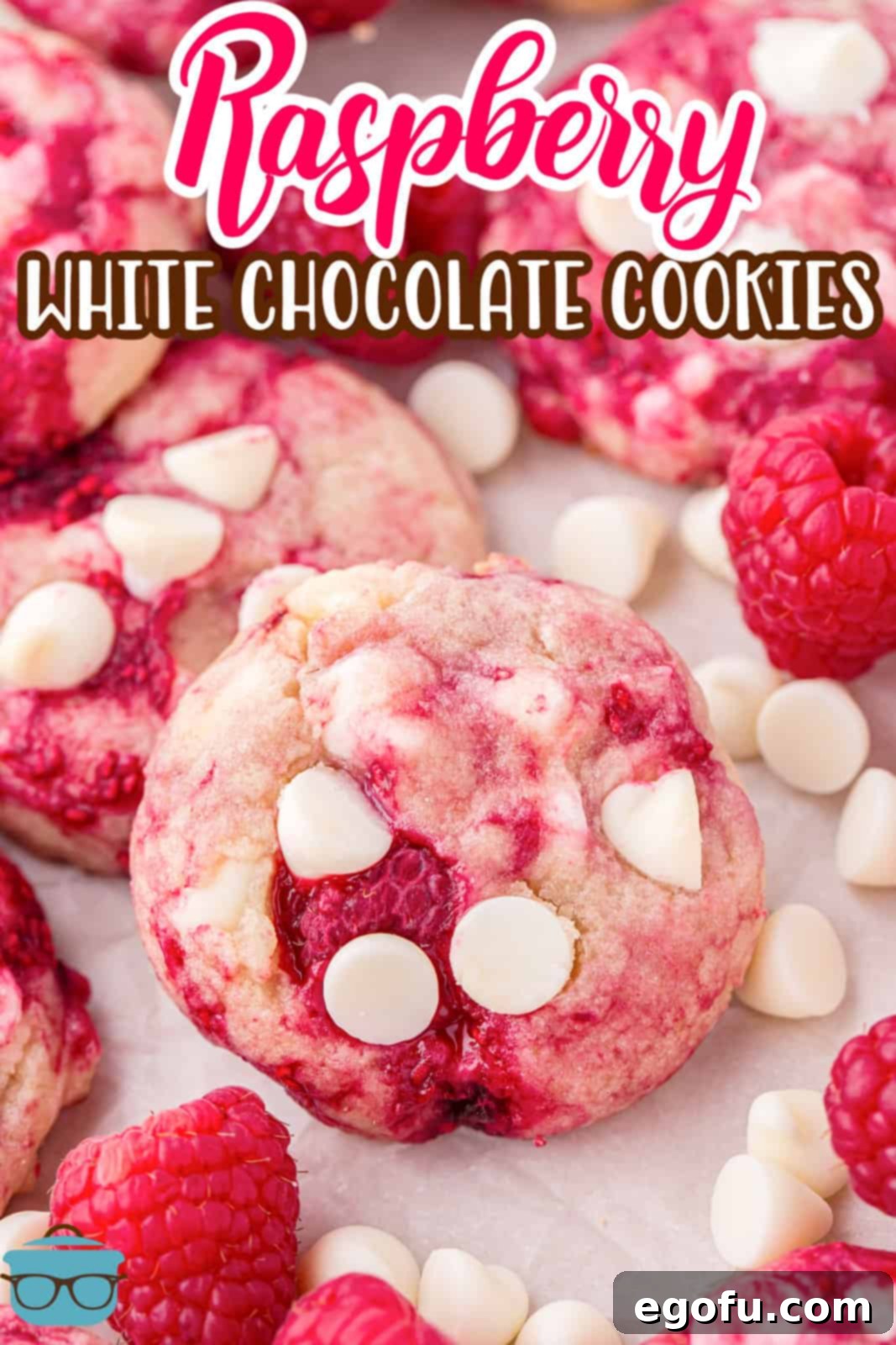 A few Raspberry White Chocolate Cookies in a pile on a plate.
