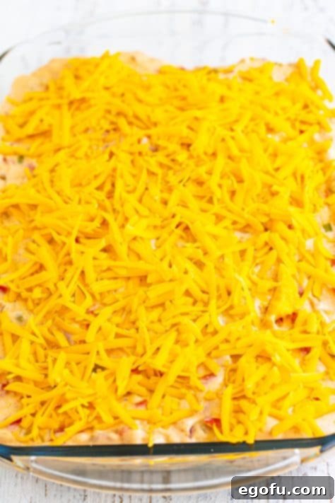 Layered King Ranch Chicken in a baking dish.