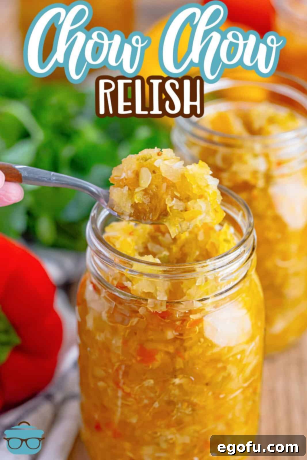 A spoon scooping out some Chow Chow Relish from a Mason jar.