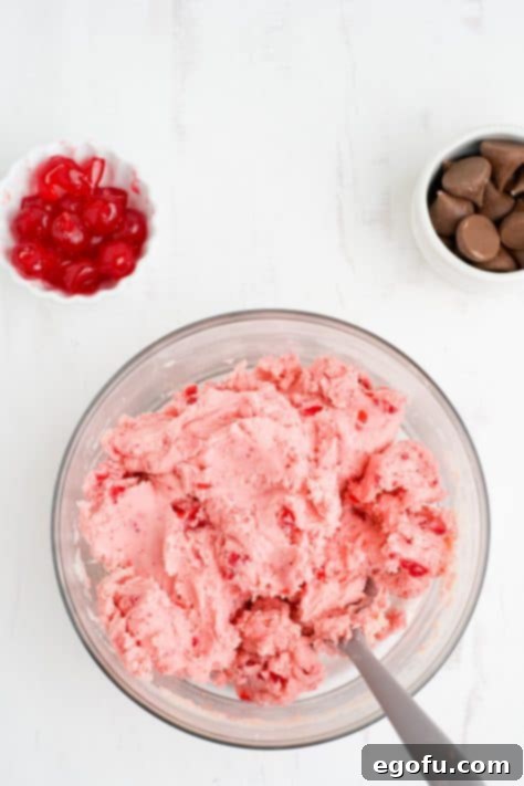 Sakura Bloom Bites 12 Pink cookie dough in a bowl.