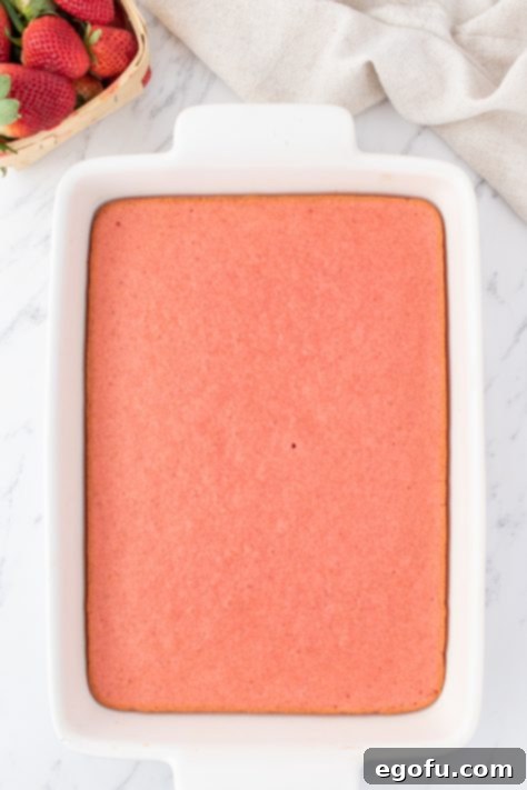 Decadent Strawberry Cake Bites 15 Homemade strawberry cake in a baking dish.