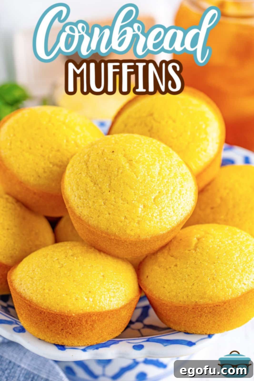 Golden Corn Muffins 3 A beautifully arranged mountain of golden Cornbread Muffins on a plate.