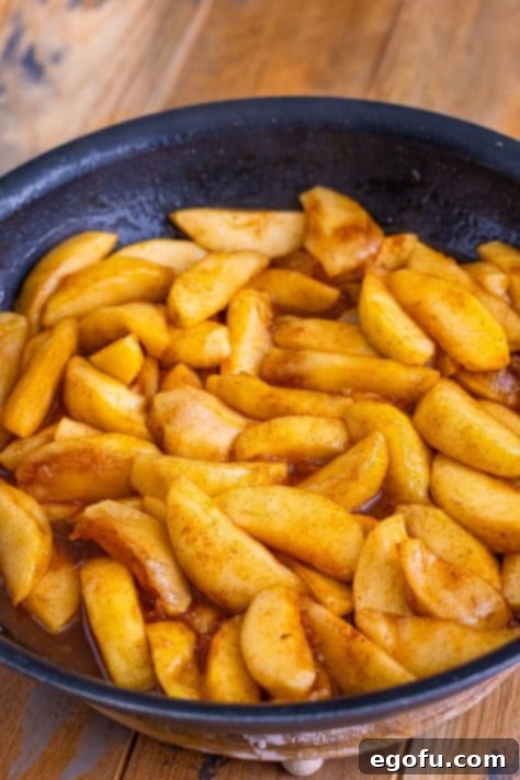 A skillet with Fried Apples in it.
