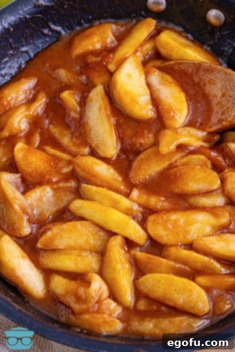 cooked apples in a skillet.