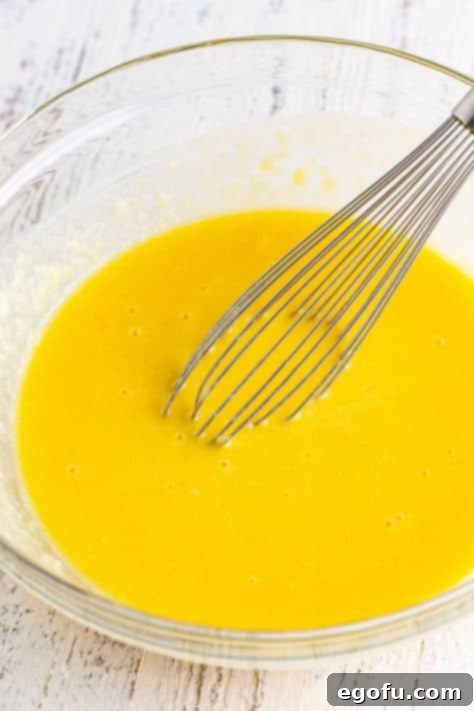 Flour, sugar, buttermilk, melted butter, eggs, lemon juice, and vanilla in a mixing bowl.