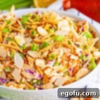 Closely looking at a bowl of creamy Asian Slaw.