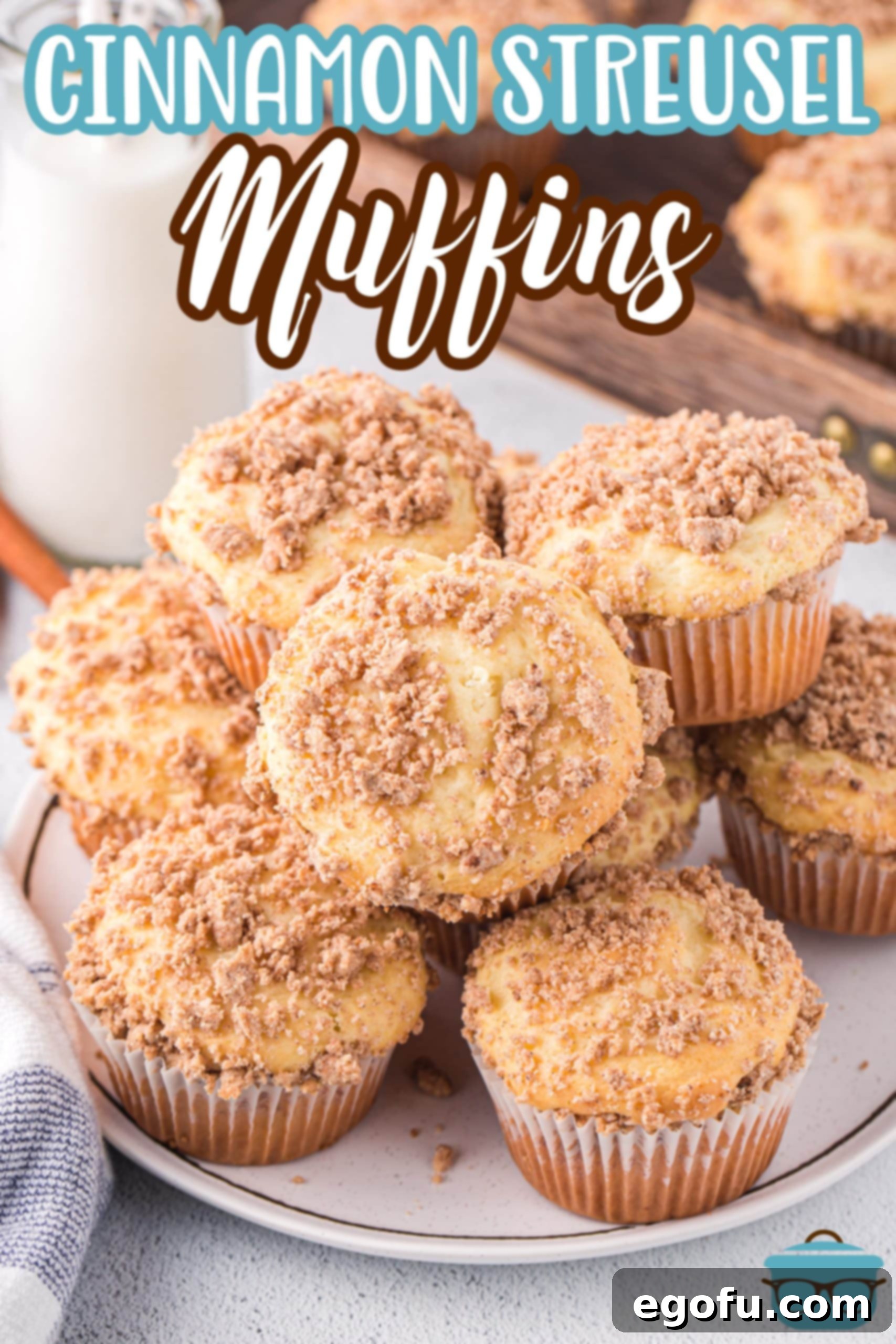 A plate of Cinnamon Streusel Cake Mix Muffins with a perfect, golden crumb topping.