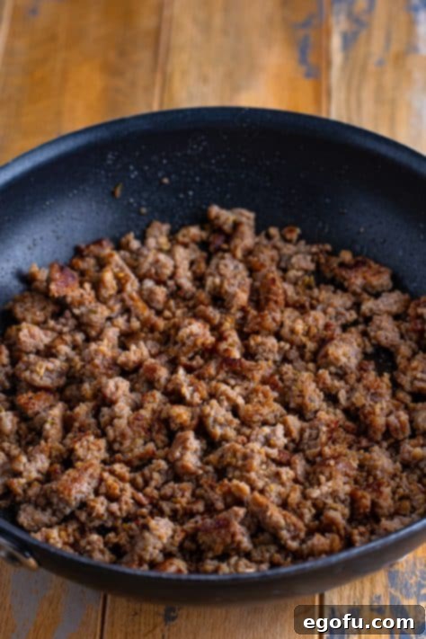 Cozy Lasagna Dinner for Two 14 cooking and crumbling Italian sausage.