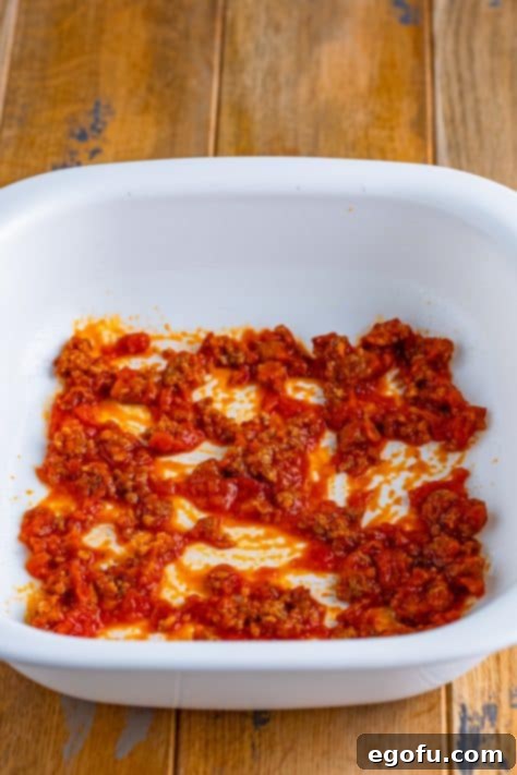 Cozy Lasagna Dinner for Two 17 A casserole dish with marinara sauce.