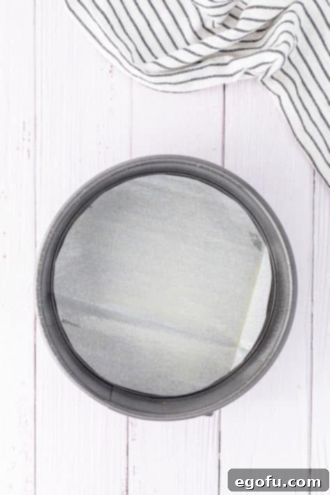 A parchment lined springform pan.