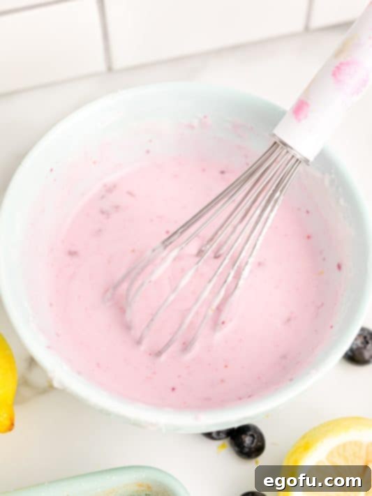 icing ingredients whisked together in a bowl