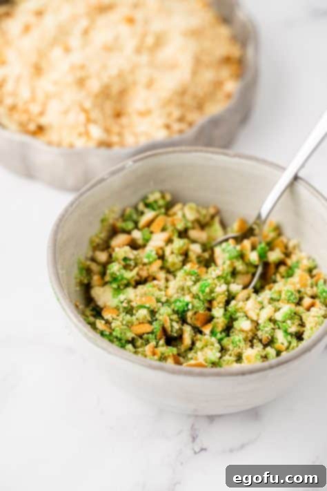 Green wafers and crumbs in a small bowl.