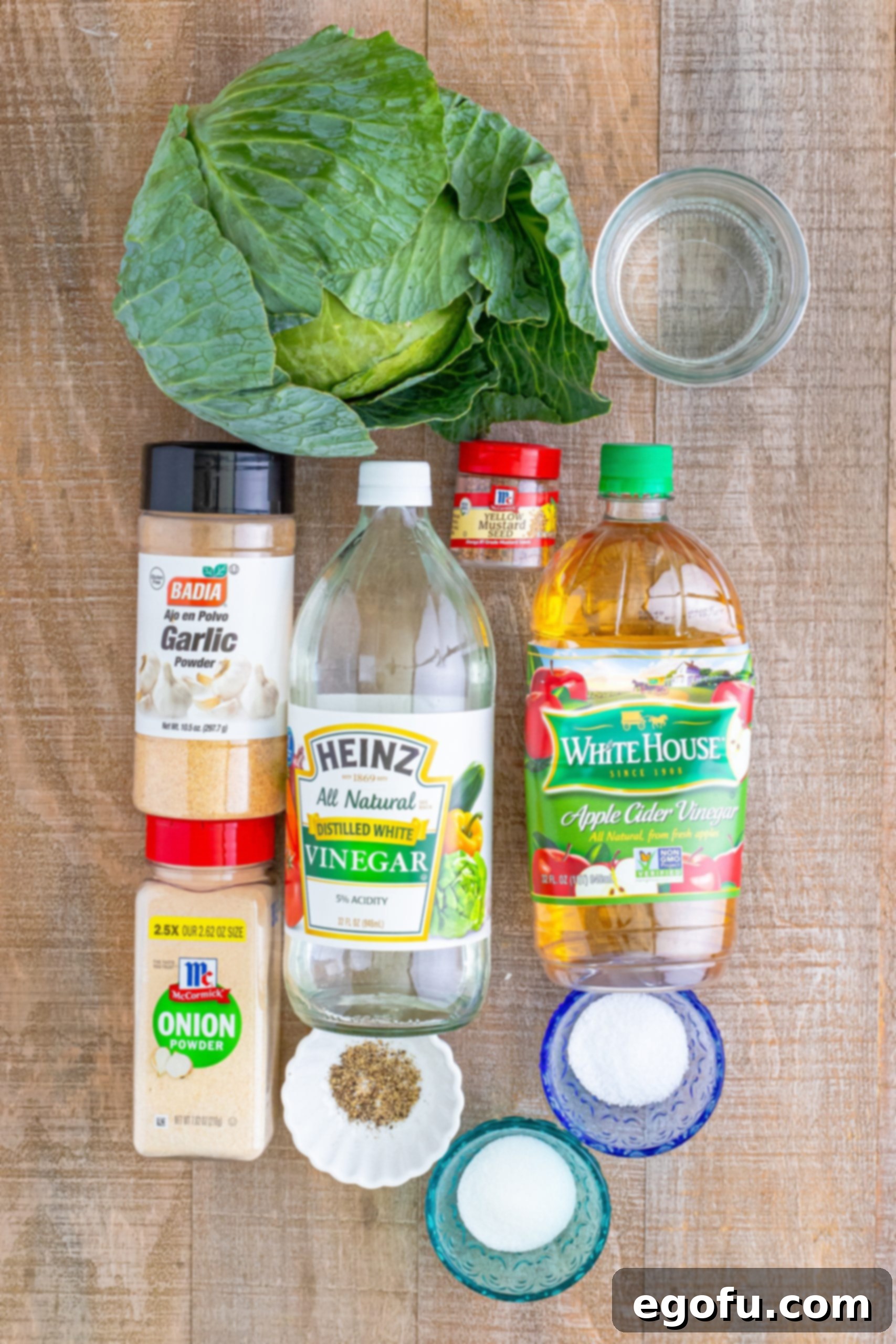 Cabbage, garlic powder, onion powder, pepper, apple cider vinegar, white vinegar, salt, sugar, mustard seeds, and onion powder. 