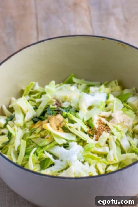 Cabbage, Add the water, apple cider vinegar, white vinegar, salt, sugar, pepper, garlic powder, mustard seeds, and onion powder in a pot.