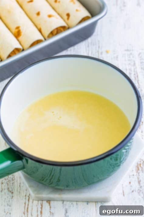 Date Night White Chicken Enchiladas 9 A saucepan of flour and melted butter and stock.