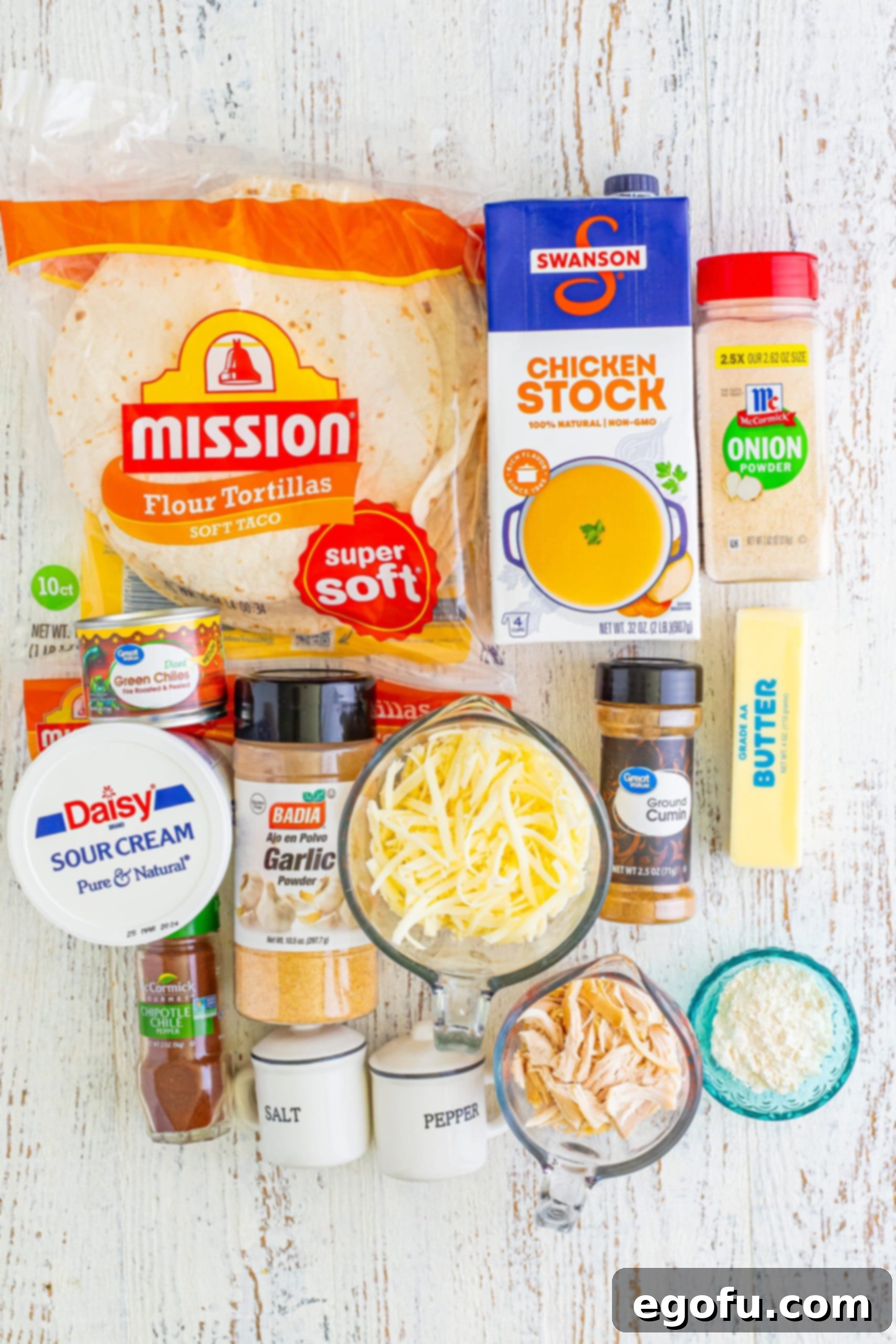 Date Night White Chicken Enchiladas 4 Taco size tortillas, shredded chicken, sour cream, shredded Monterey Jack cheese, black pepper, garlic powder, salt, garlic powder, cumin, onion powder chipotle powder, butter, flour, chicken stock, and diced green chiles.