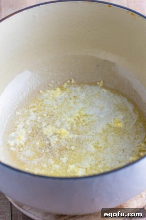 Wholesome Pasta O's 6 Melted butter and garlic in a Dutch oven.