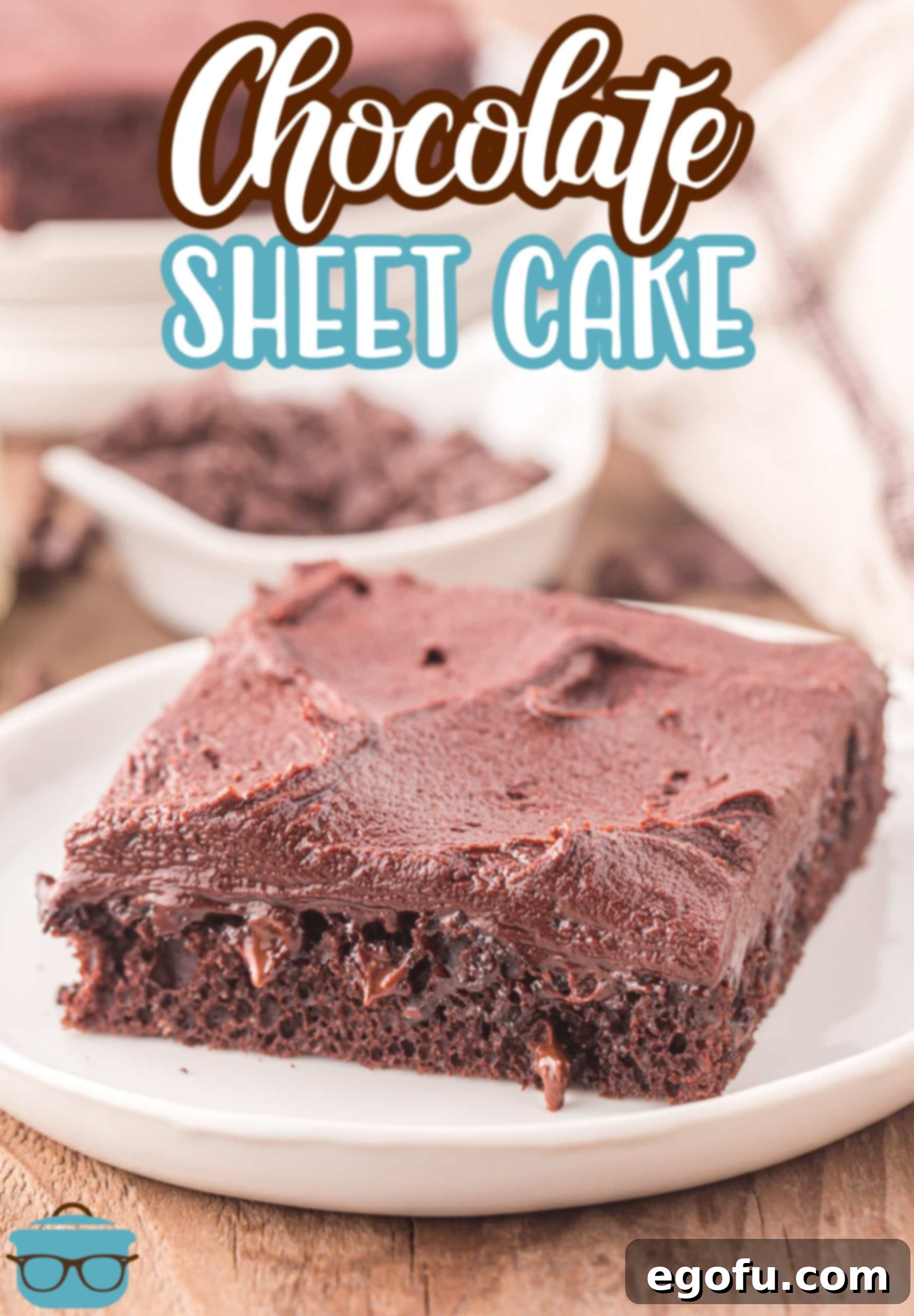 A perfectly portioned piece of Chocolate Sheet Cake on a white plate, ready to be enjoyed.