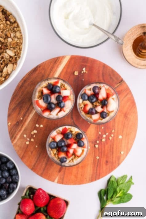 Assembled and layered Yogurt Parfaits in glasses.