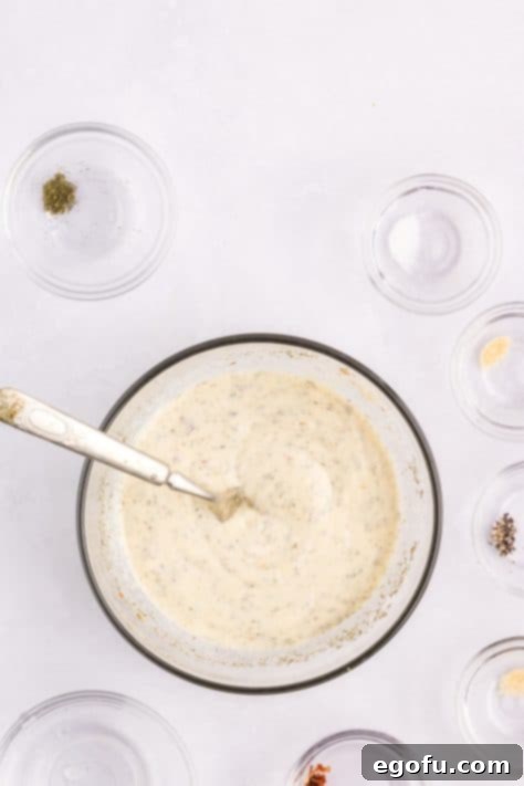 Creamy homemade dressing in a bowl.