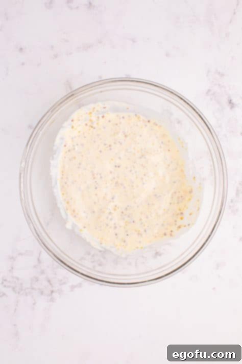 Ultimate Air Fryer Roast Beef Melts 8 A horseradish, mayo, stone ground mustard sauce in a bowl.