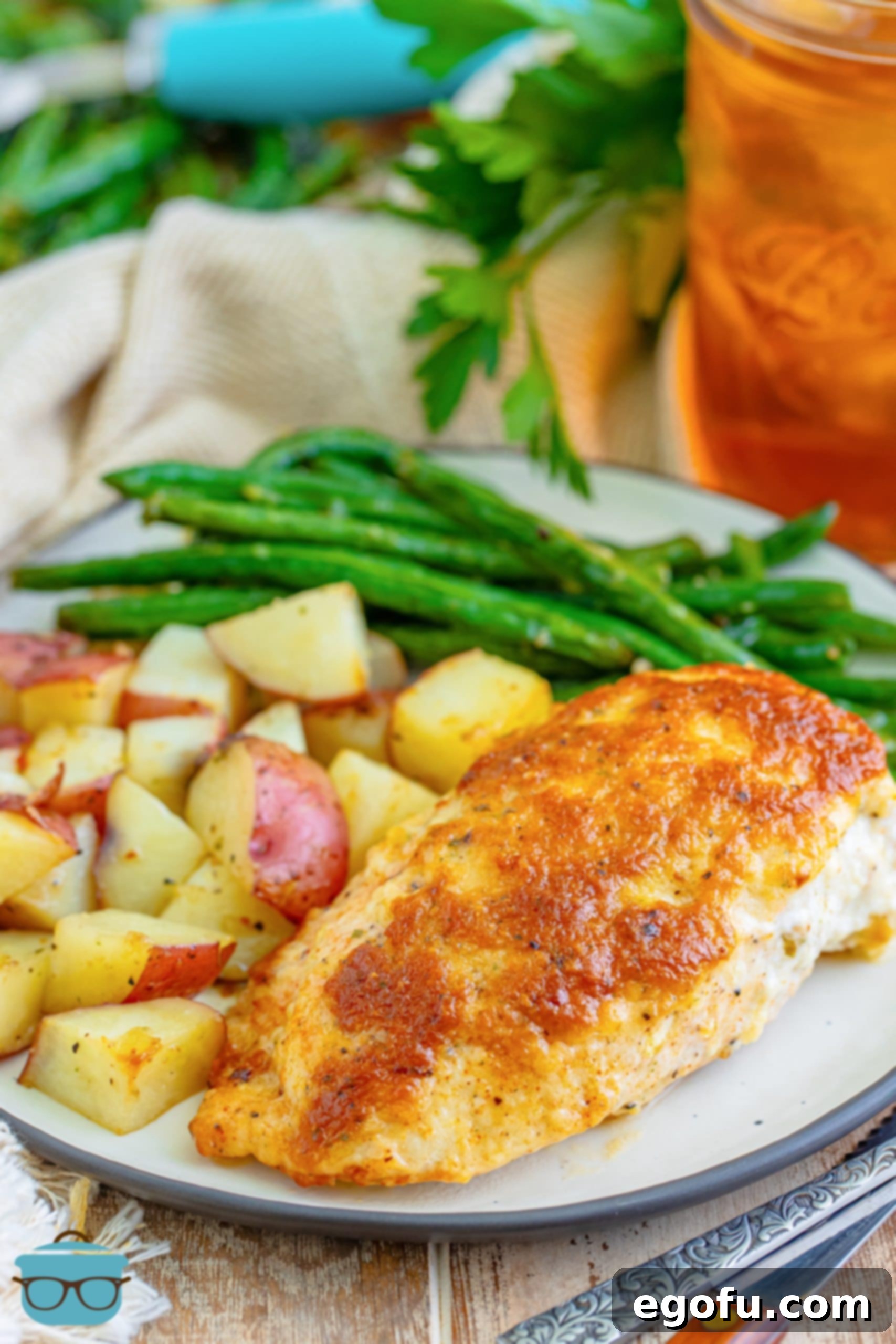 One-Pan Garlic Parmesan Chicken Dinner for Two 8 Close up looking at a plated Garlic Parmesan Chicken dinner.