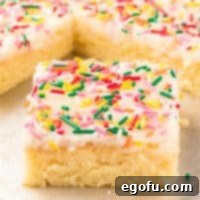 A large slice of White Texas Sheet Cake.