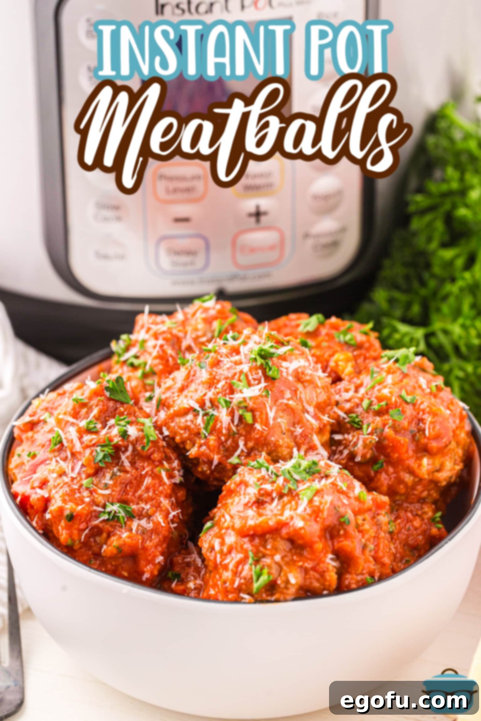 A large serving bowl filled with steaming, perfectly cooked meatballs generously coated in marinara sauce, with an Instant Pot visible in the background.