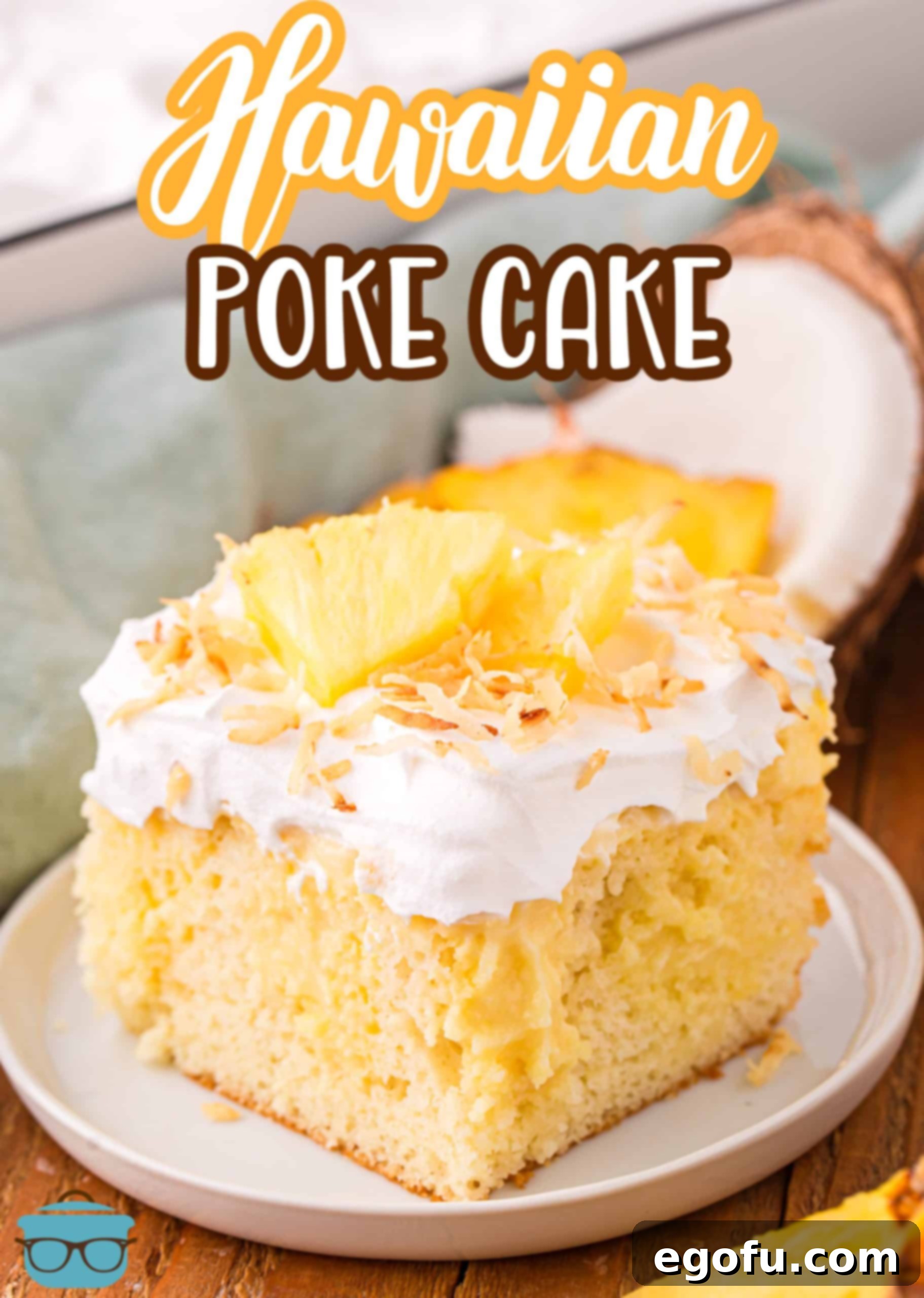 Sun-Kissed Hawaiian Poke Cake 3 A delectable slice of Hawaiian Poke Cake on a white plate, ready to be enjoyed.