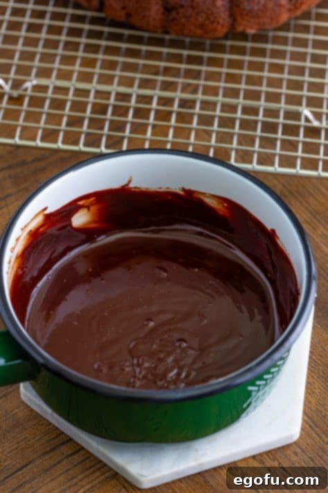 Velvet Chocolate Pudding Bundt 17 Smooth chocolate sauce in a small sauce pan.