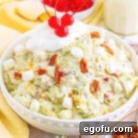 Looking down on a large serving bowl of Tropical Watergate Salad.