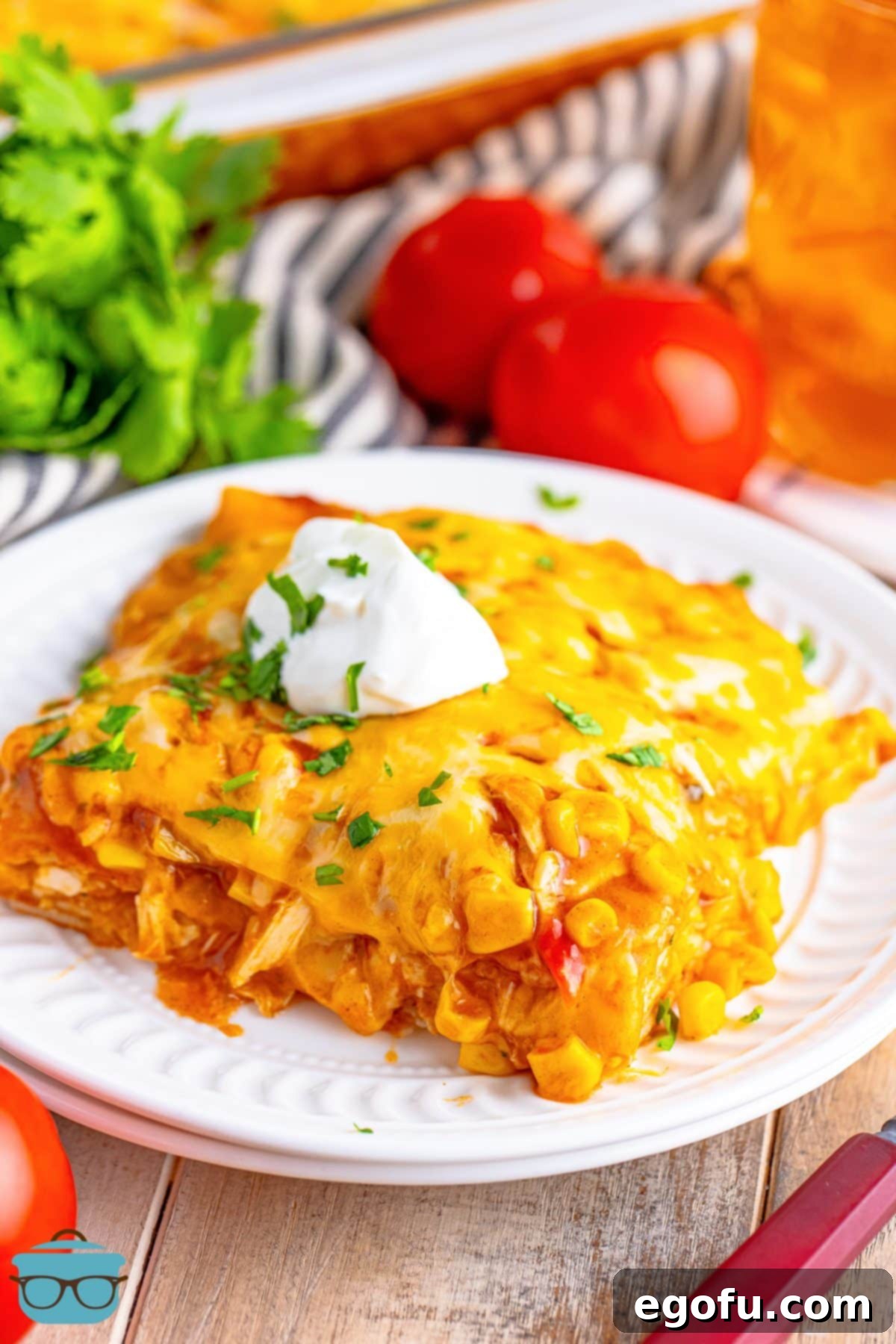 Cheesy Chicken Enchilada Fiesta 9 A large serving of Chicken Enchilada Casserole, ready to be enjoyed.