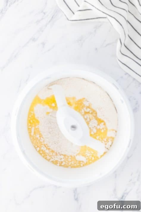 melted butter added to flour mixture.