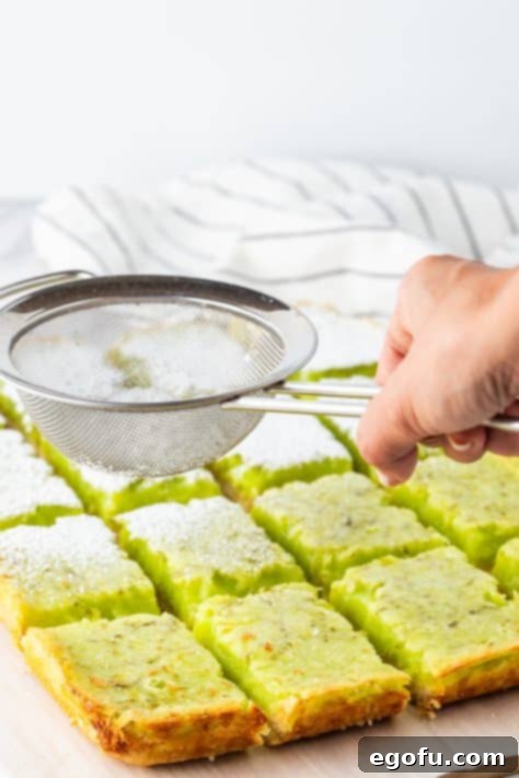 dusting lime bars with powdered sugar.