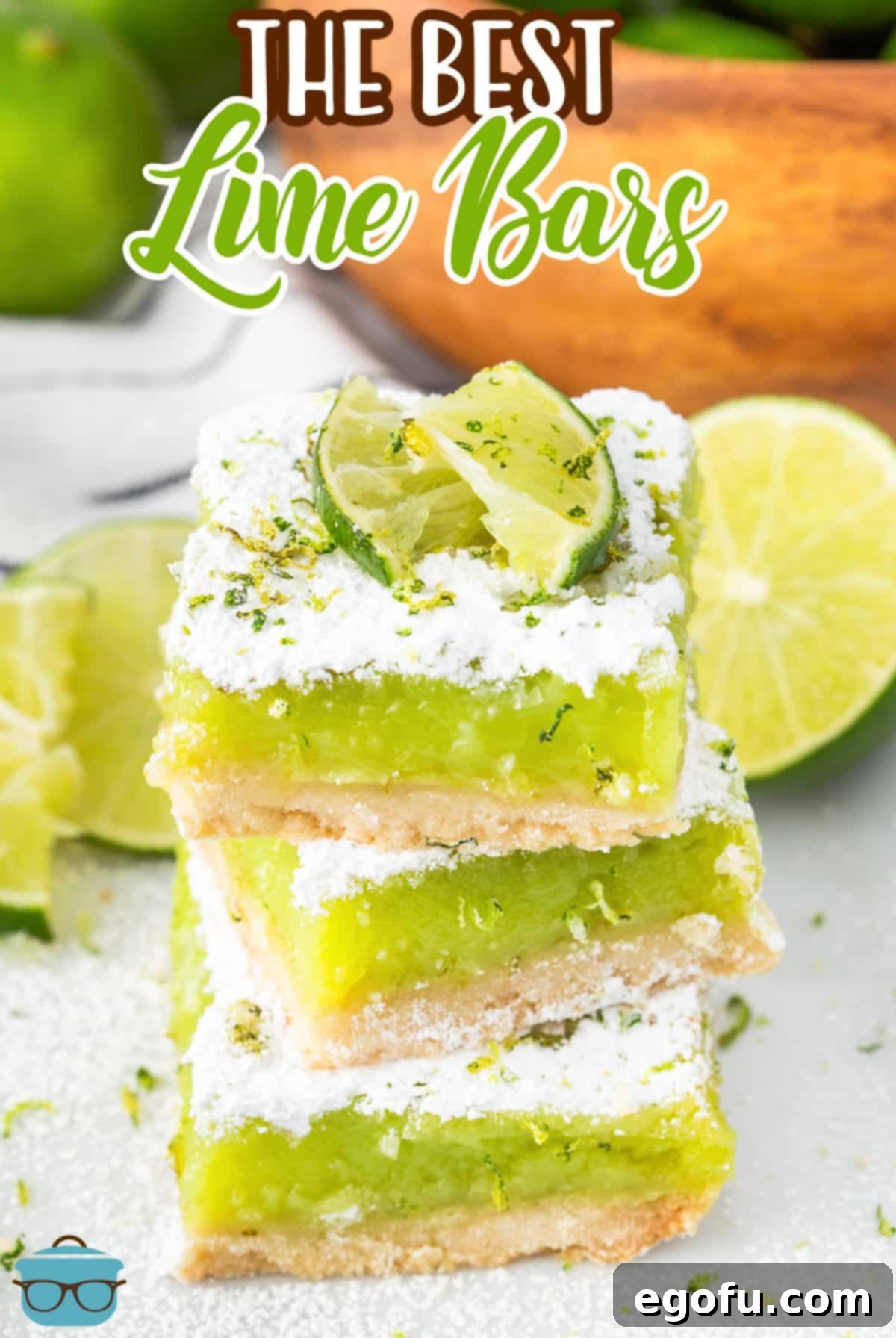 A small stack of perfectly sliced Lime Bars, showcasing their vibrant green filling and golden crust.