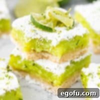 A Lime Bar missing a bite sitting on top of a second bar.