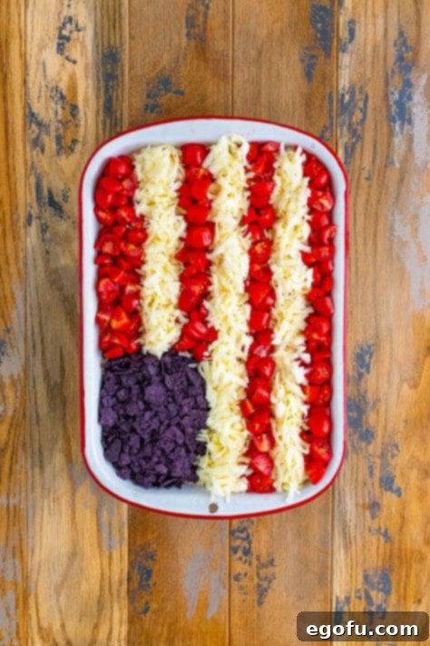 Stars and Stripes Celebration Dip 20 A full 4th of July Taco Dip in a baking dish.