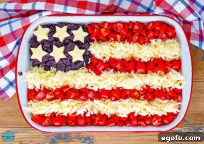 Stars and Stripes Celebration Dip 21 Looking down on a baking dish with a 4th of July Flag Dip.