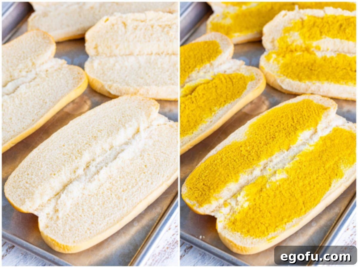 A collage of two photos: the first showing open sub rolls resting on a tray, ready for fillings; the second showing yellow mustard being spread evenly onto the insides of the sub rolls on the tray, preparing them for the classic Kmart Sub.