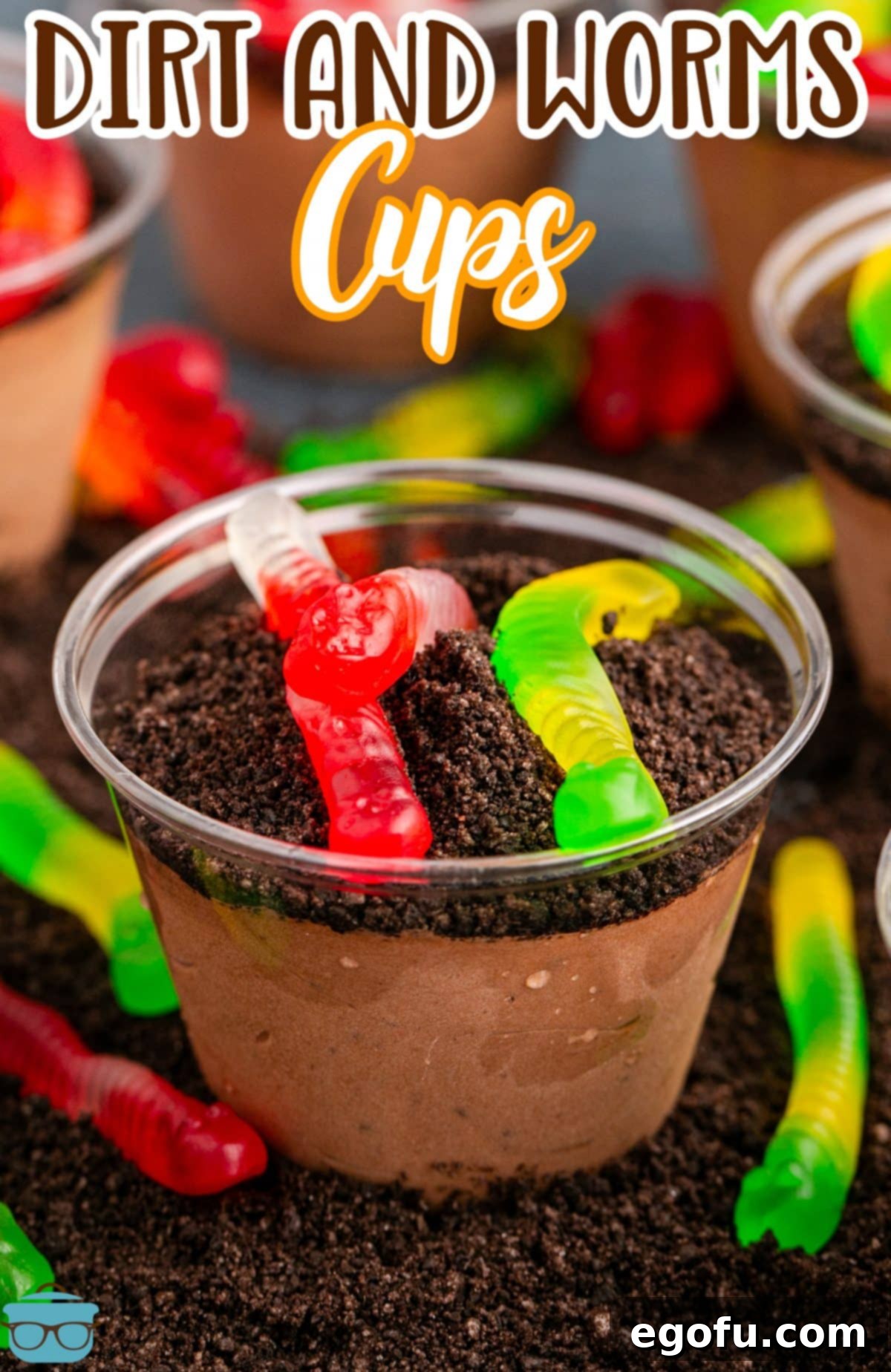 Looking at a Dirt Cup with pudding and Oreo topping with gummy worms.