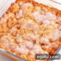 Golden Butter Soaked Cinnamon Sugar Biscuits 9 Looking down on a dish of Cinnamon Sugar Butter Swim Biscuits.