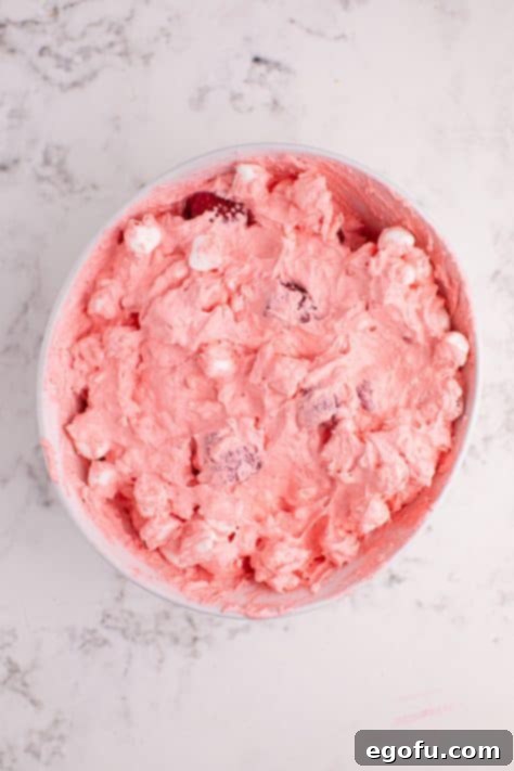 A mixed up Raspberry Fluff Salad waiting to be chilled.