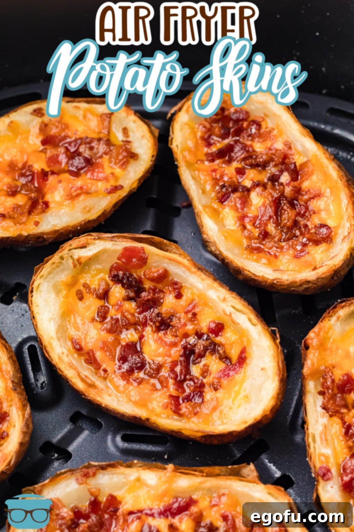 Crispy Air Fryer Potato Skins nestled in the air fryer basket after cooking, showcasing their golden-brown exterior.