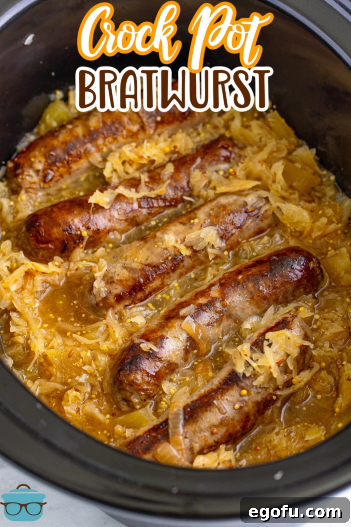 Hearty Slow Cooker Brats with Sauerkraut 3 A slow cooker full of Crockpot Brats, simmering to perfection.