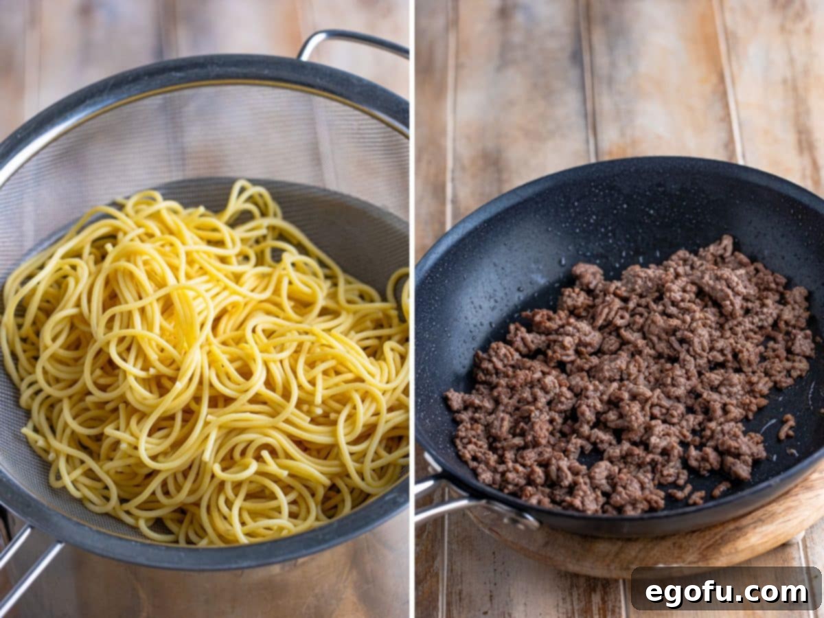 A strainer with cooked spaghetti and a skillet with cooked ground beef, showing the initial preparation steps.