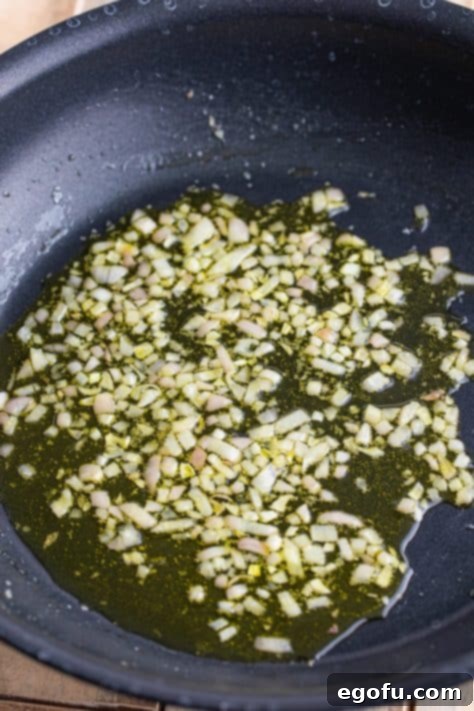 Zesty Piccata Chicken Bites 18 Olive oil and shallots in a skillet.