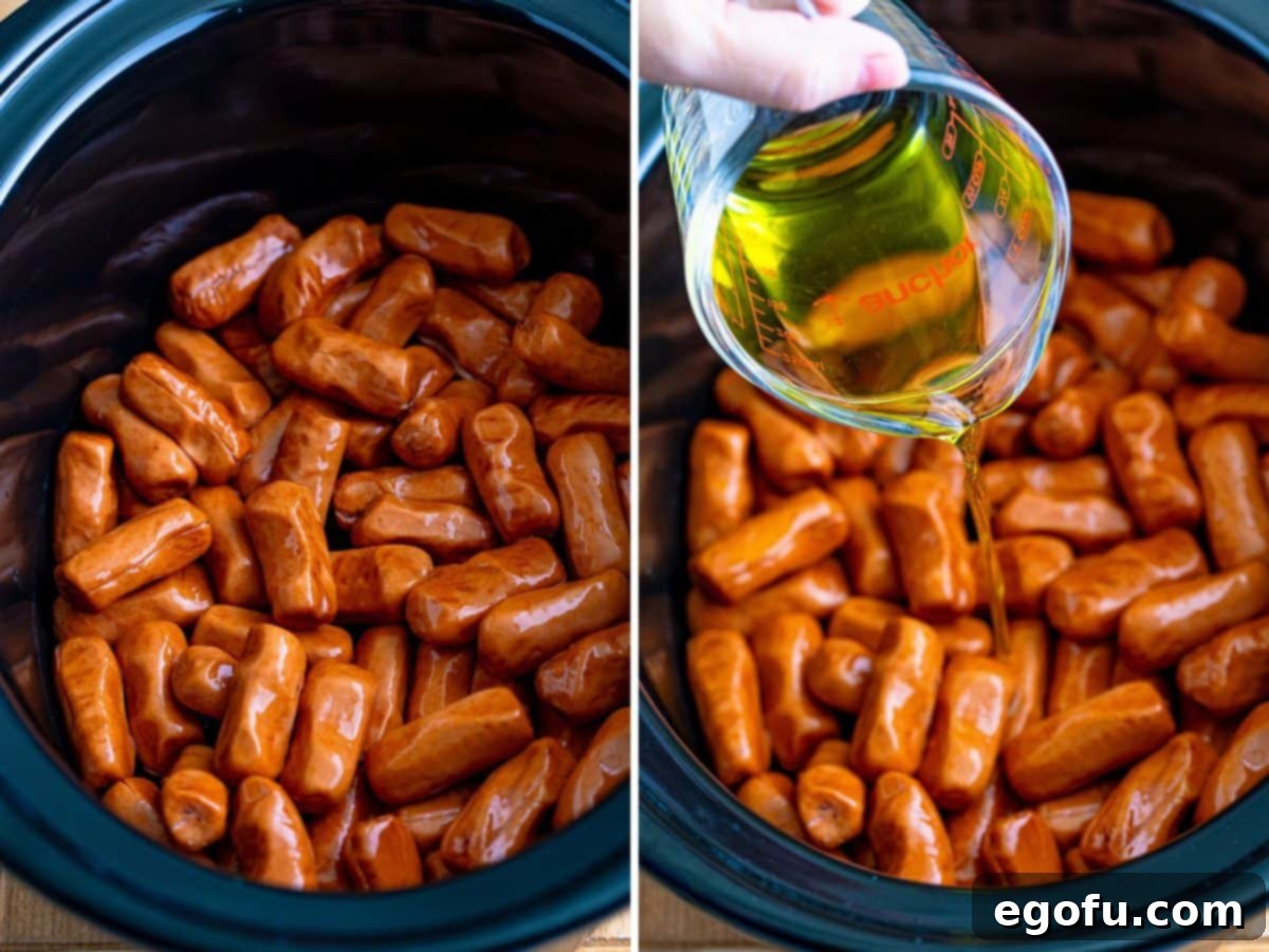 Irresistible Slow Cooker Mississippi Sausages 5 A slow cooker filled with Lit'l Smokies, with pepperoncini juice being poured over the sausages.