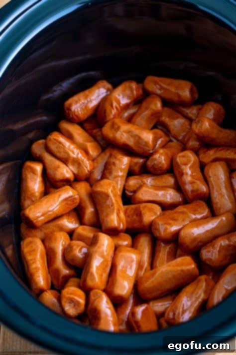 Irresistible Slow Cooker Mississippi Sausages 9 Little Smokies in a Crockpot.