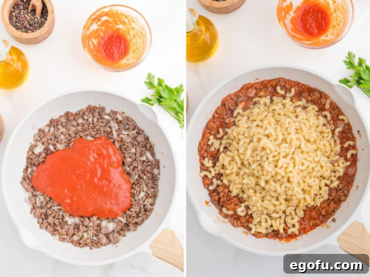 A skillet with cooked ground beef, onion, and tomato sauce and a skillet with pasta being aded to beef sauce. 
